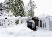 Outdoor grill in snow